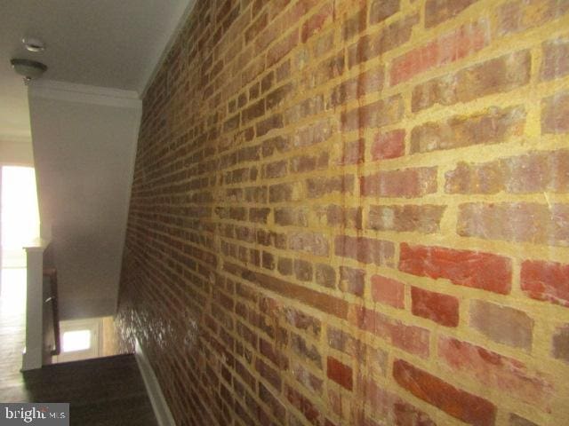 16 Gilmor St, Baltimore, MD 21223 - hall with crown molding and brick wall