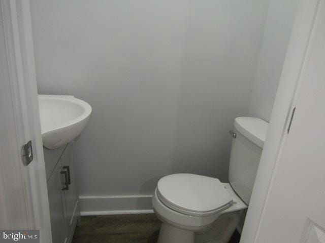 16 Gilmor St, Baltimore, MD 21223 - bathroom featuring toilet and vanity