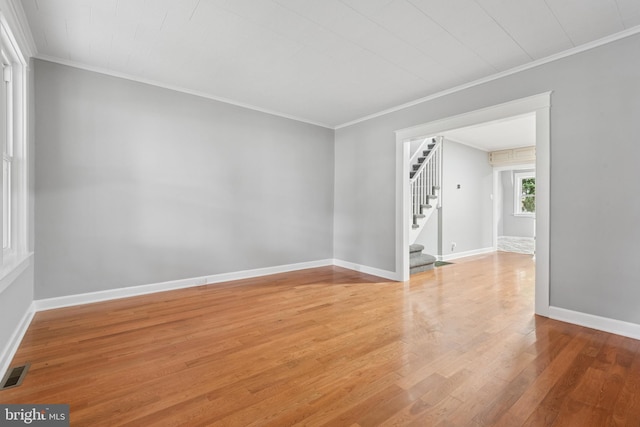 430 S W End Ave, Lancaster, PA 17603 - empty room featuring crown molding, light wood-type flooring, and stairs