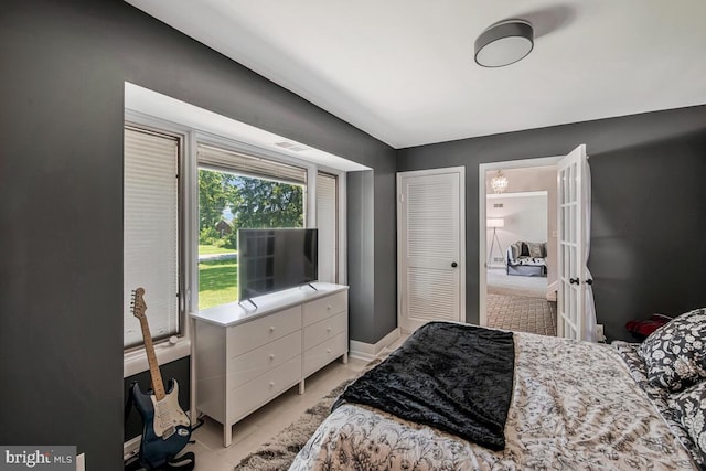 8825 Briarcroft Ln, Laurel, MD 20708 - bedroom featuring baseboards and a closet