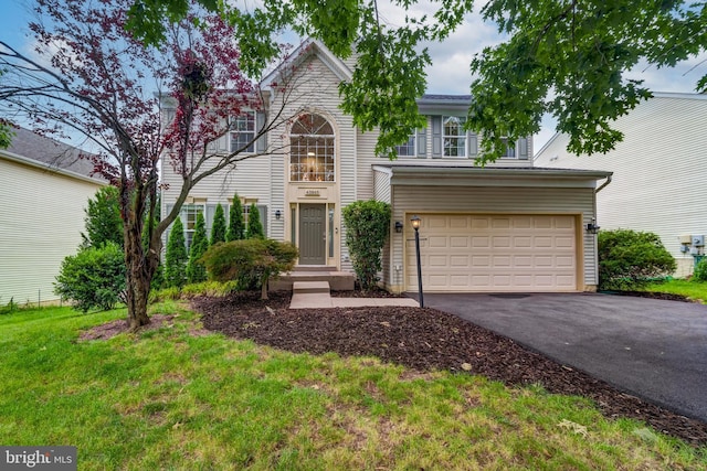43865 Laurel Ridge Dr, Ashburn, VA 20147 - view of front of property featuring driveway, an attached garage, and a front lawn