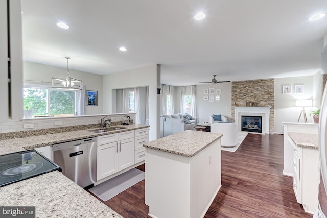 43865 Laurel Ridge Dr, Ashburn, VA 20147 - kitchen featuring stainless steel dishwasher, healthy amount of natural light, a kitchen island, ceiling fan, and recessed lighting