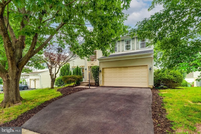 43865 Laurel Ridge Dr, Ashburn, VA 20147 - view of front facade with driveway, a garage, and a front yard
