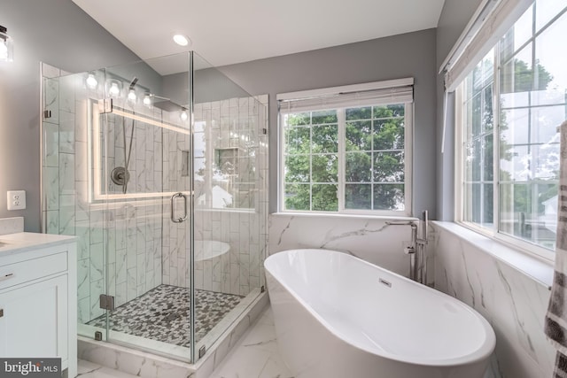 43865 Laurel Ridge Dr, Ashburn, VA 20147 - bathroom with marble finish flooring, a soaking tub, vanity, and a stall shower