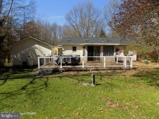 26 Grouse Trl, Albrightsville, PA 18210 - back of house with a deck and a yard