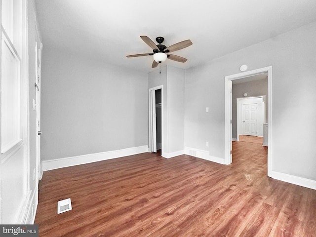534 Columbia Ave, Millville, NJ 08332 - empty room with a ceiling fan and wood finished floors