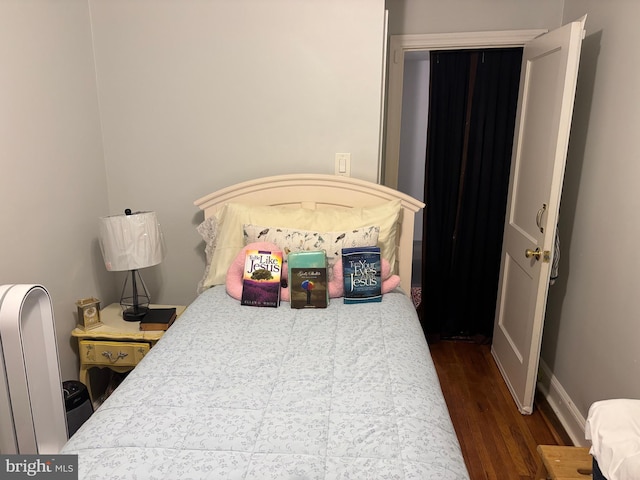 823 Church Ln, Lansdowne, PA 19050 - bedroom with dark wood-type flooring and baseboards