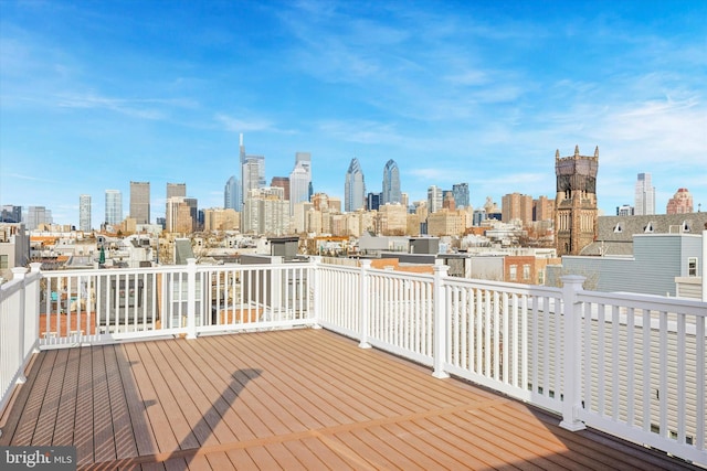 2121 Carpenter St Unit 2, Philadelphia, PA 19146 - wooden terrace with a skyline view