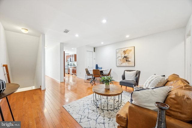 2121 Carpenter St Unit 2, Philadelphia, PA 19146 - living room featuring light wood-type flooring and recessed lighting