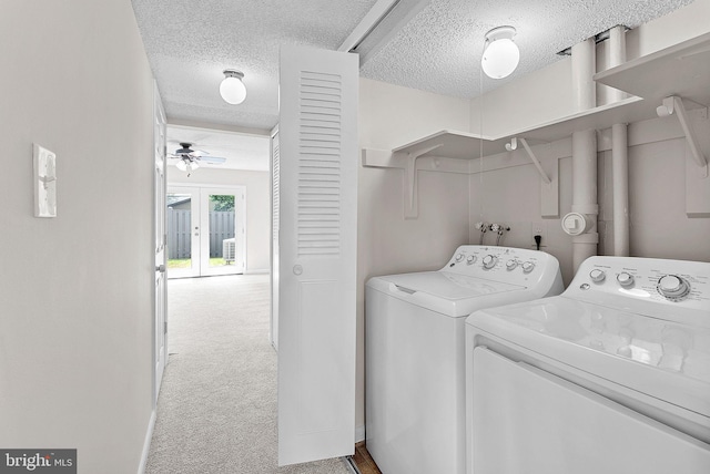 104 Drury Cir, Sterling, VA 20164 - laundry room with washing machine and clothes dryer, a textured ceiling, ceiling fan, and carpet floors