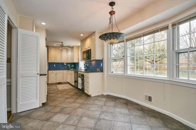 1006 Kimberwicke Rd, Mclean, VA 22102 - kitchen with black microwave, decorative backsplash, recessed lighting, a ceiling fan, and stone finish flooring