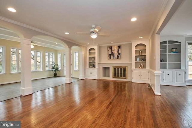 1006 Kimberwicke Rd, Mclean, VA 22102 - unfurnished living room featuring decorative columns, a ceiling fan, wood finished floors, crown molding, and recessed lighting