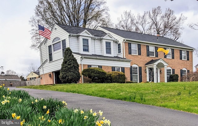 1006 Kimberwicke Rd, Mclean, VA 22102 - view of front of house featuring brick siding and a chimney