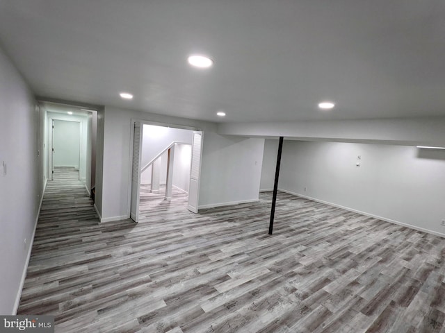 1006 Kimberwicke Rd, Mclean, VA 22102 - finished below grade area with wood finished floors and recessed lighting