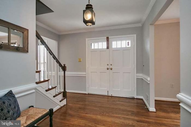 1006 Kimberwicke Rd, Mclean, VA 22102 - foyer entrance with wood finished floors, stairs, and crown molding