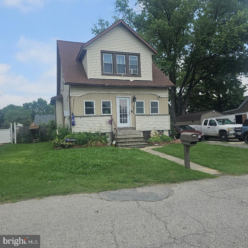 2906 Ohio Ave, Halethorpe, MD 21227 - bungalow-style house featuring entry steps, a front yard, and roof with shingles