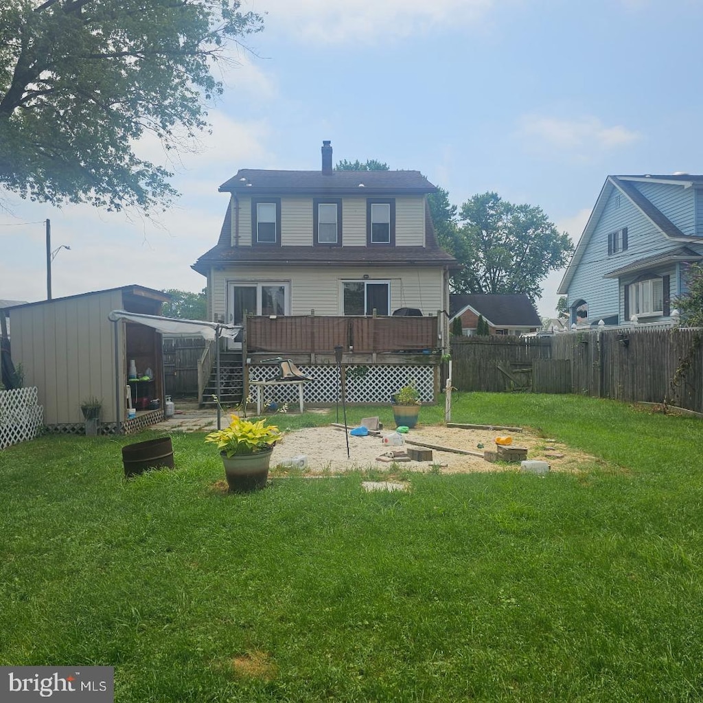 2906 Ohio Ave, Halethorpe, MD 21227 - rear view of property with a deck and a fenced backyard