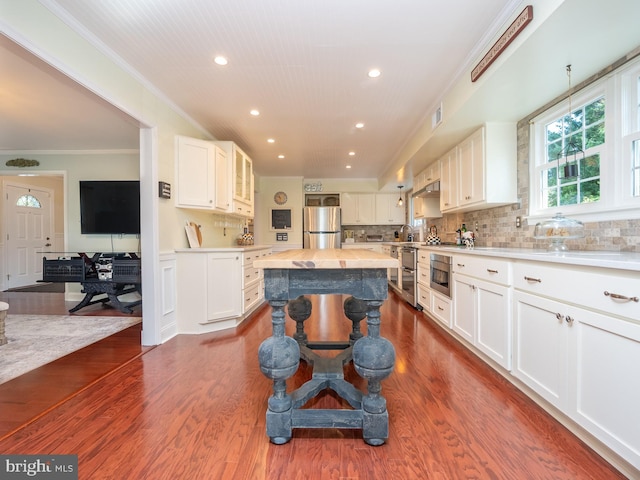 220 Rabbitt Rd, Gaithersburg, MD 20878 - kitchen featuring freestanding refrigerator, crown molding, recessed lighting, white cabinets, and dark wood-style flooring