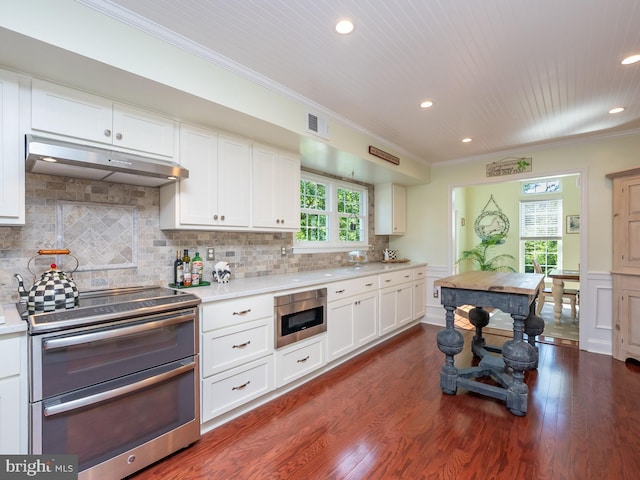 220 Rabbitt Rd, Gaithersburg, MD 20878 - kitchen featuring double oven range, under cabinet range hood, ornamental molding, recessed lighting, and light countertops