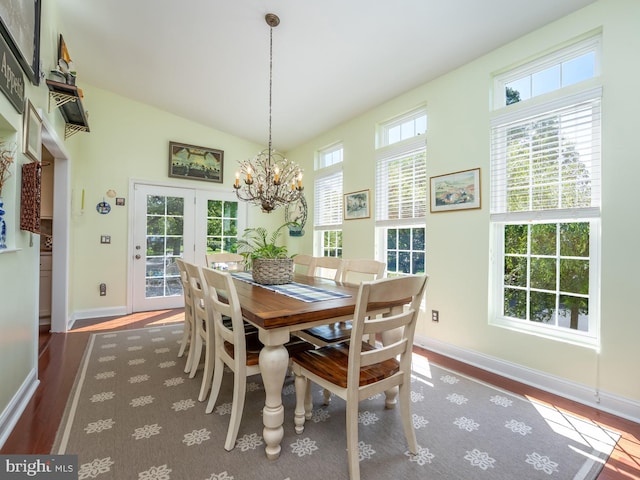 220 Rabbitt Rd, Gaithersburg, MD 20878 - dining space with wood finished floors, a chandelier, and vaulted ceiling