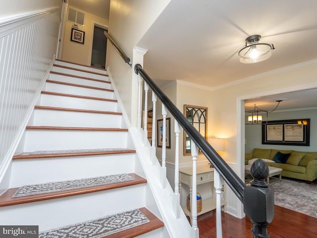 220 Rabbitt Rd, Gaithersburg, MD 20878 - stairs with wood finished floors, crown molding, and a chandelier
