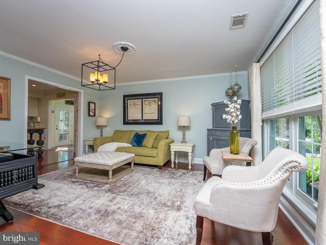 220 Rabbitt Rd, Gaithersburg, MD 20878 - living area with crown molding, a chandelier, and wood finished floors