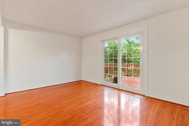 2843 Shepperton Ter, Silver Spring, MD 20904 - unfurnished room featuring wood finished floors and a textured ceiling