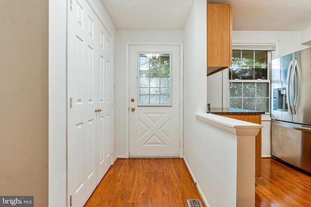 2843 Shepperton Ter, Silver Spring, MD 20904 - entryway with light wood-style floors and baseboards