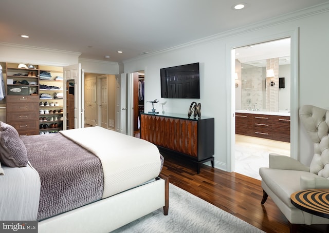 44 W Mechanic St, New Hope, PA 18938 - bedroom featuring a spacious closet, ornamental molding, dark wood-style floors, a closet, and recessed lighting