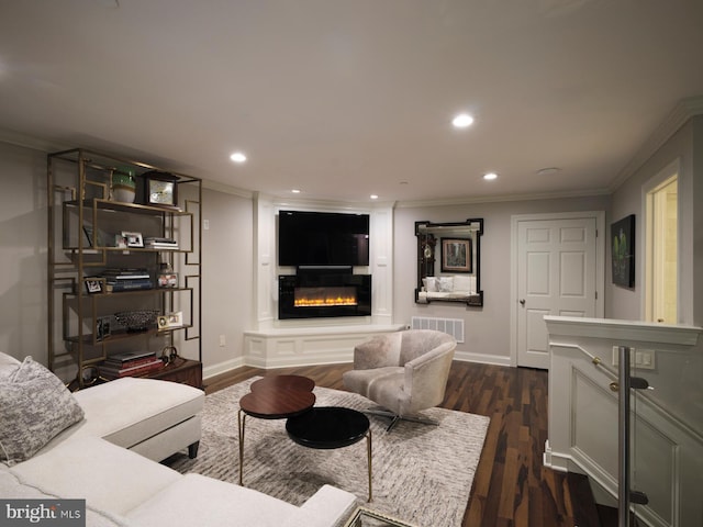 44 W Mechanic St, New Hope, PA 18938 - living room with crown molding, a glass covered fireplace, recessed lighting, and dark wood finished floors