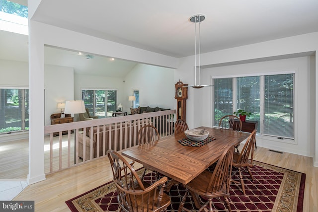 9 Sleepy Hollow Ln, West Windsor, NJ 08550 - dining area featuring light wood-type flooring and vaulted ceiling