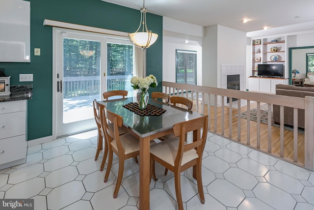9 Sleepy Hollow Ln, West Windsor, NJ 08550 - dining room featuring a fireplace and built in features
