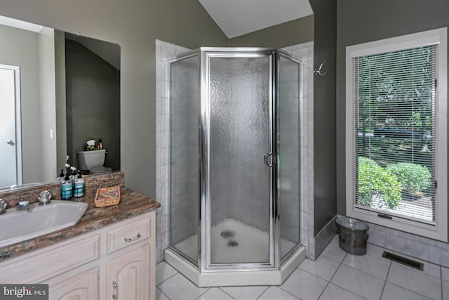 9 Sleepy Hollow Ln, West Windsor, NJ 08550 - bathroom featuring vanity, a shower stall, tile patterned flooring, and lofted ceiling