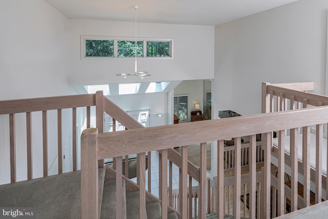 9 Sleepy Hollow Ln, West Windsor, NJ 08550 - stairs featuring a chandelier