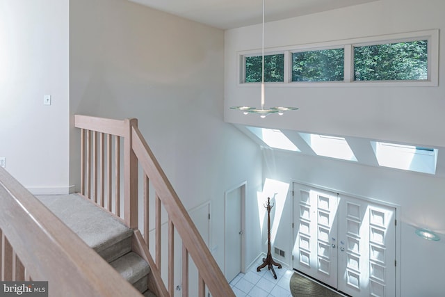 9 Sleepy Hollow Ln, West Windsor, NJ 08550 - stairway featuring a skylight and baseboards