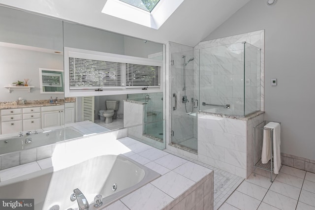 9 Sleepy Hollow Ln, West Windsor, NJ 08550 - full bath with a skylight, vaulted ceiling, a stall shower, a jetted tub, and vanity