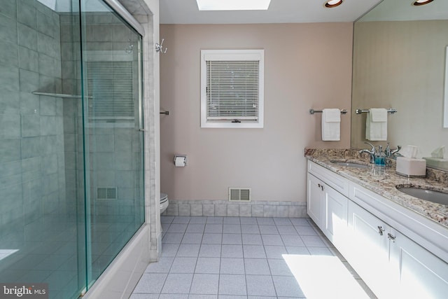 9 Sleepy Hollow Ln, West Windsor, NJ 08550 - full bath featuring double vanity, tile patterned floors, recessed lighting, and a skylight