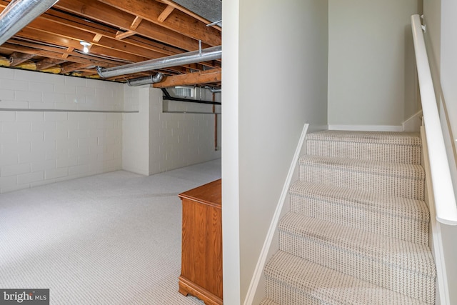 9 Sleepy Hollow Ln, West Windsor, NJ 08550 - staircase with carpet and concrete block wall