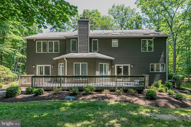 9 Sleepy Hollow Ln, West Windsor, NJ 08550 - back of property featuring a wooden deck, a chimney, and a yard
