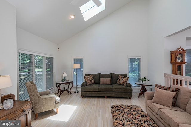 9 Sleepy Hollow Ln, West Windsor, NJ 08550 - living room featuring high vaulted ceiling, a skylight, light wood-style floors, and recessed lighting