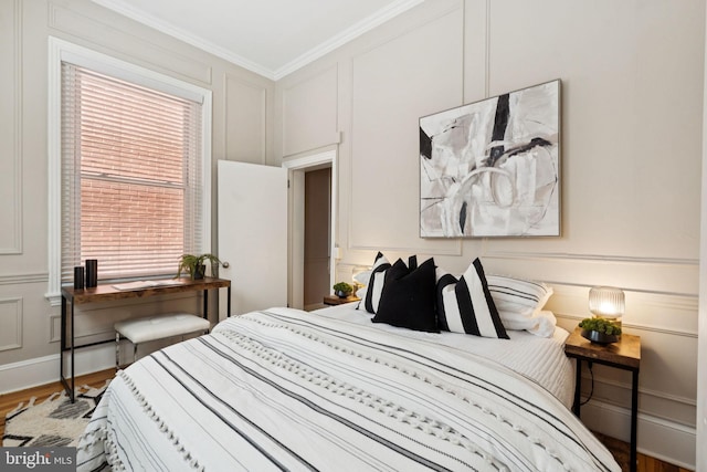 238 S 13th St Unit 1, Philadelphia, PA 19107 - bedroom featuring a decorative wall, crown molding, and wood finished floors
