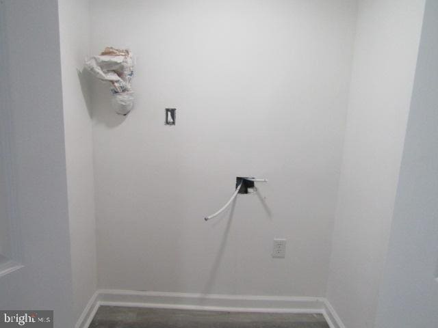 1303 N Patterson Park Ave, Baltimore, MD 21213 - laundry area featuring baseboards