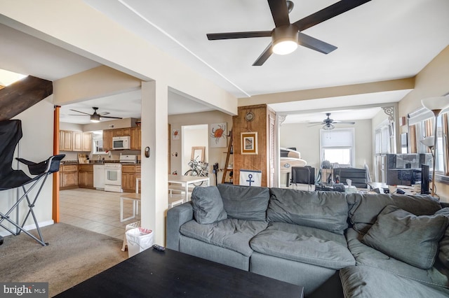 119 S Captains Dr, Little Egg Harbor Twp, NJ 08087 - living area with ceiling fan, light tile patterned floors, and light colored carpet
