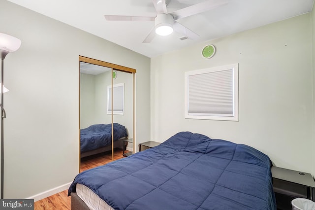 119 S Captains Dr, Little Egg Harbor Twp, NJ 08087 - bedroom featuring wood finished floors, a closet, and a ceiling fan