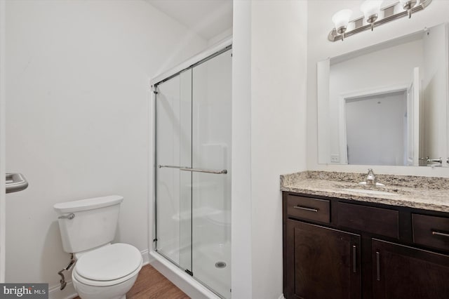 200 Harvin Way Unit 231, Brookhaven, PA 19015 - bathroom with vanity, a shower stall, and wood finished floors
