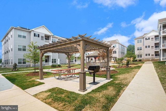 200 Harvin Way Unit 231, Brookhaven, PA 19015 - view of property's community with a pergola and a lawn
