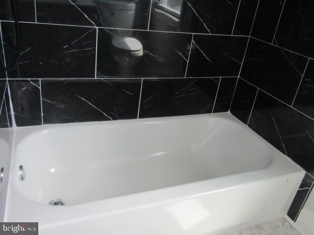 4223 Roland View Ave, Baltimore, MD 21215 - bathroom with a shower