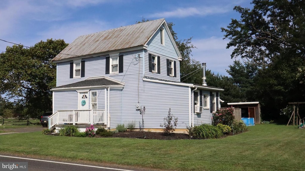 931 Jacksonville Mount Holly Rd, Bordentown, NJ 08505 - view of side of property featuring a lawn
