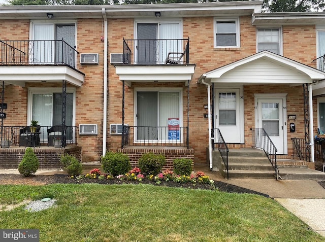 135 Dartmouth Ave, Somerdale, NJ 08083 - view of property with brick siding, a front yard, and an AC wall unit