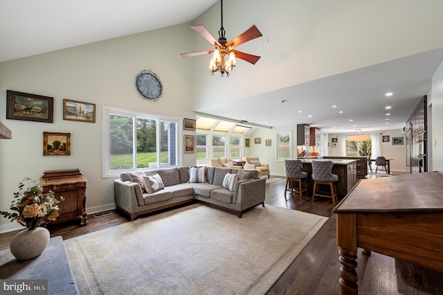10309 E Hunter Valley Rd, Vienna, VA 22181 - living room featuring recessed lighting, dark wood-style flooring, a ceiling fan, and high vaulted ceiling